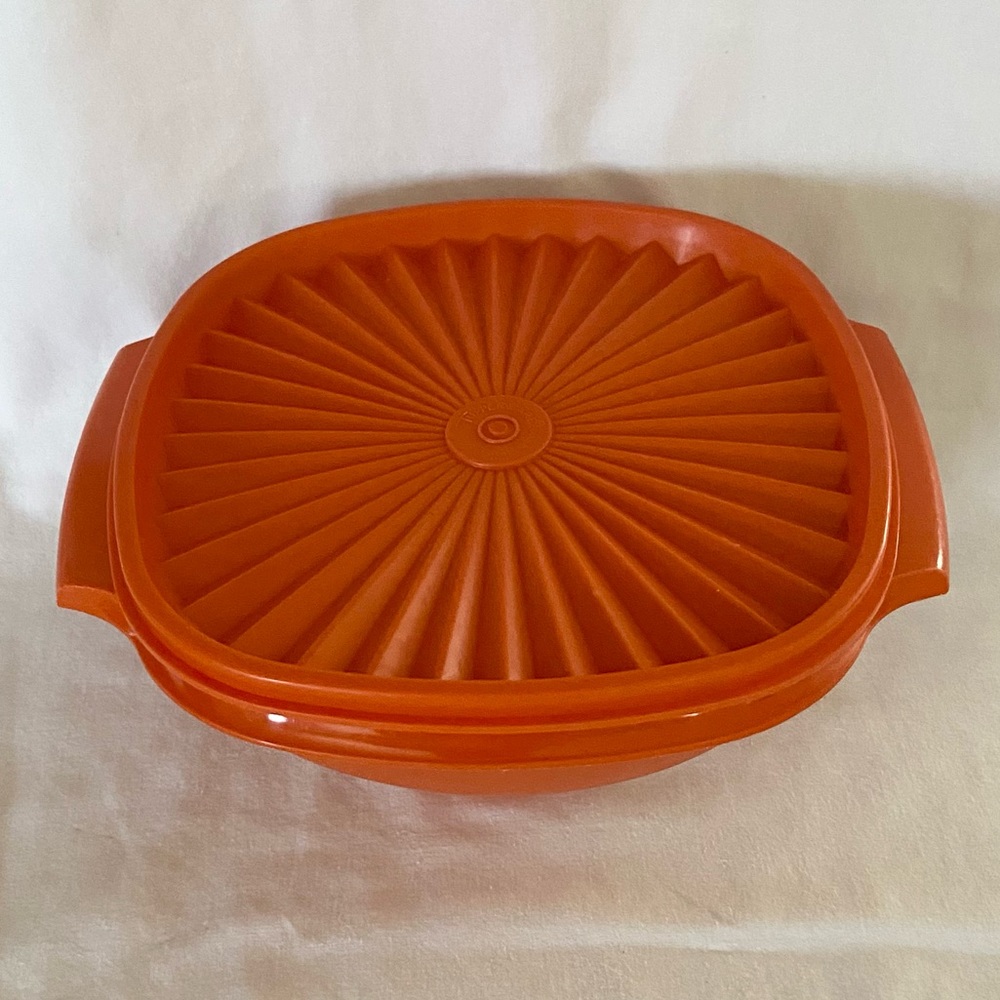 Tupperware container in 1970’s orange color